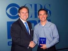 Matt Broderick (right) President of DiagnosTemps receives a True Blue plaque from Scott Sams